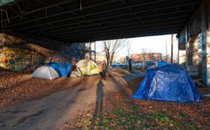 Tents set up by homeless under the bridge on the bike path in Northampton.